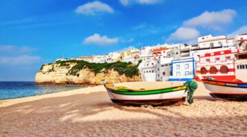 Portuguese beach villa in Carvoeiro classic fishing boats. Summe
