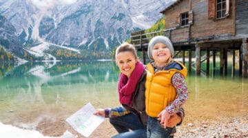 Mother and baby on lake braies in south tyrol, italy
