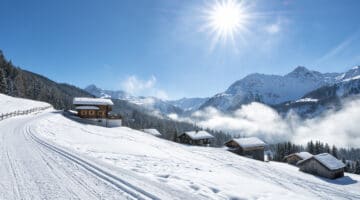 winter landscape with ski lodge in austrian alps