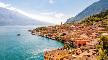 Limone Sul Garda cityscape on the shore of Garda lake surrounded by scenic Northern Italian nature. Amazing Italian cities of Lombardy